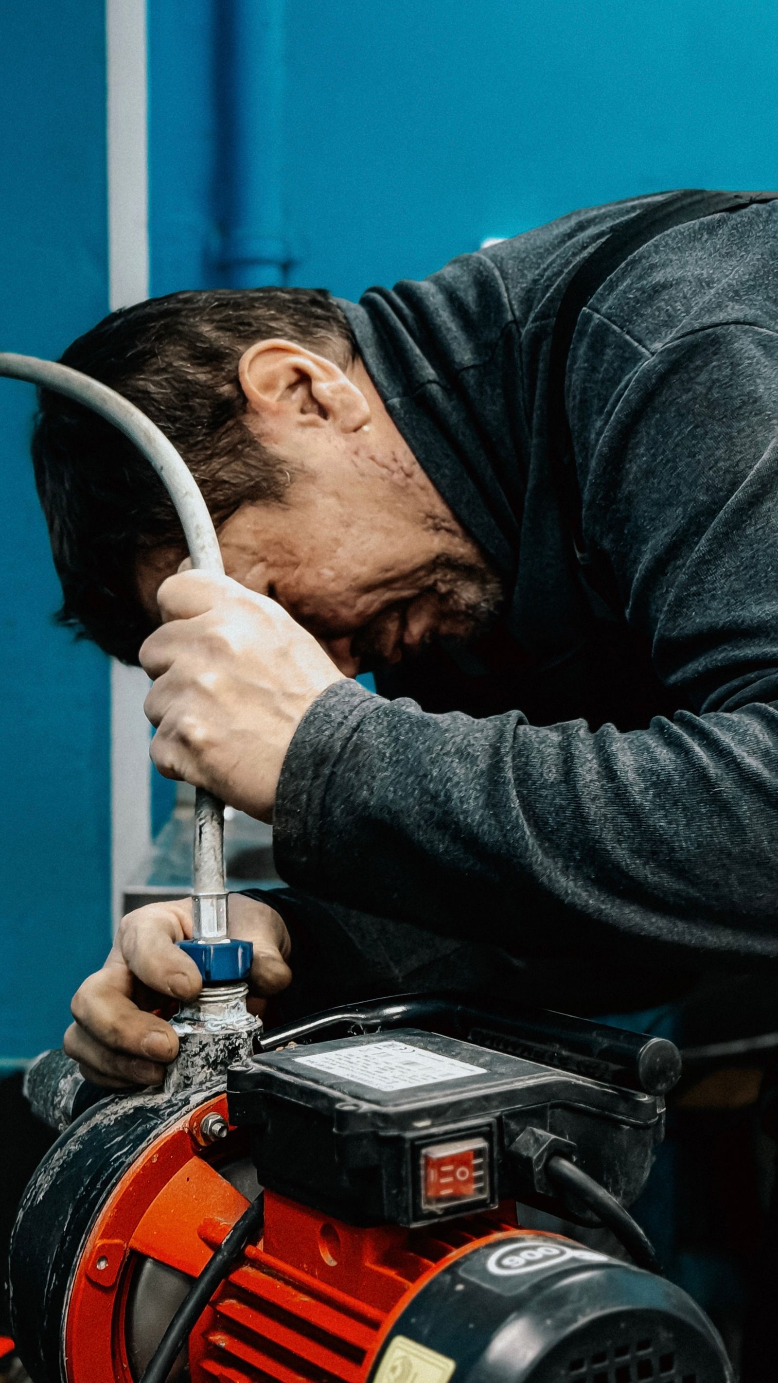 Plumber repairing a residential fixture
